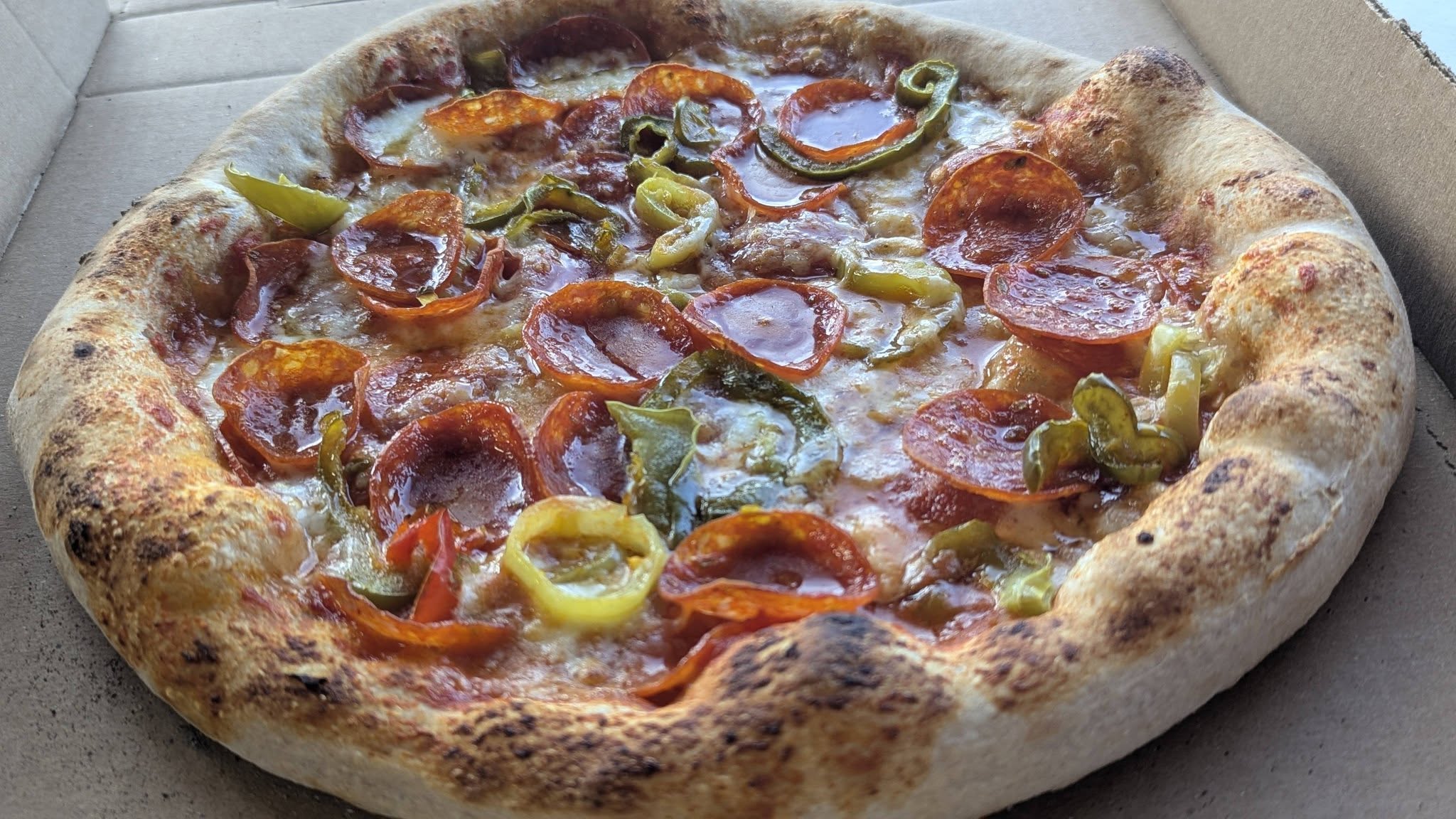 Nite Owl's Flint Fire pizza with pepperoni and peppers